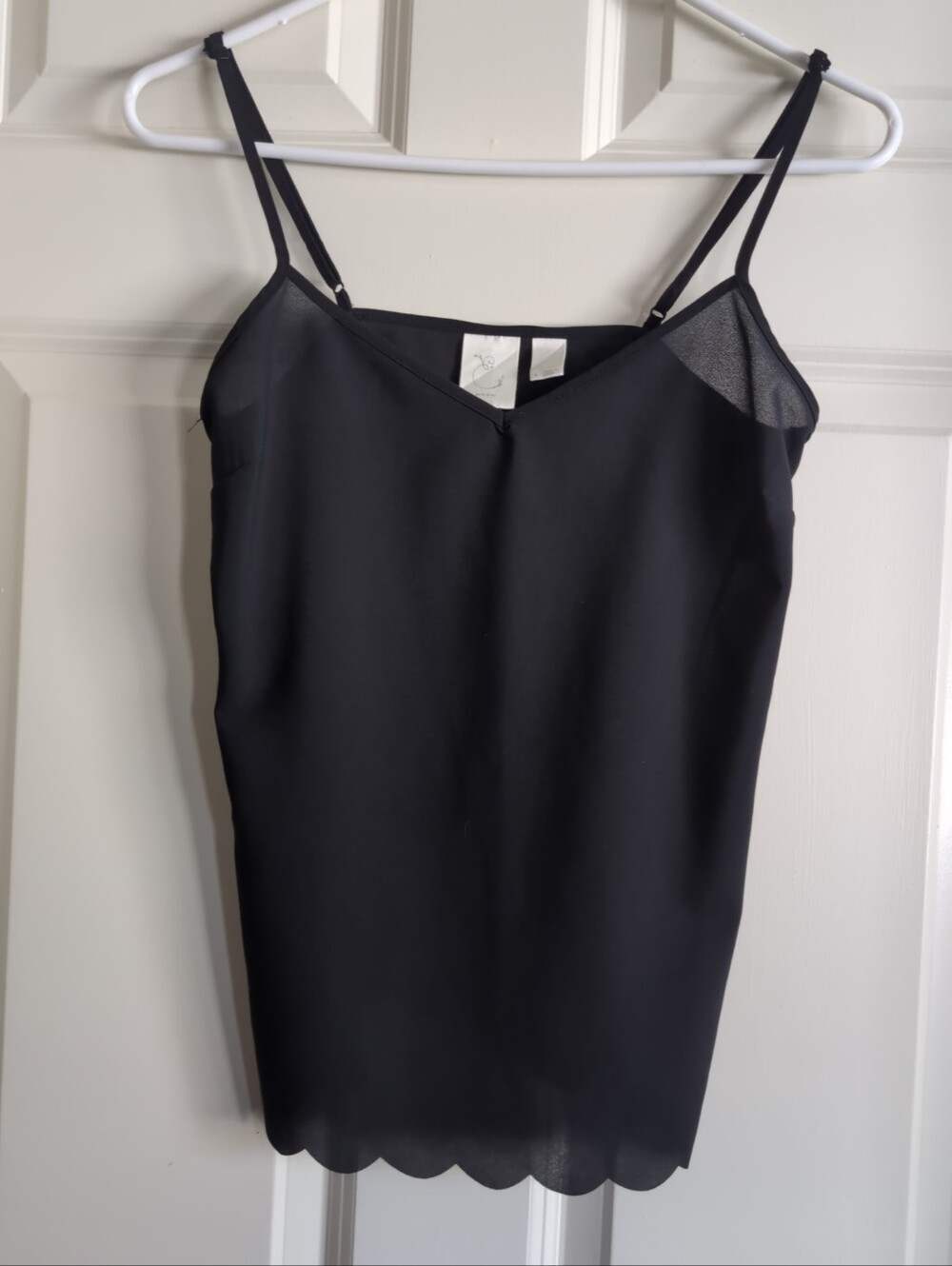 Black semi sheer mesh cami tank top with scalloped hem and adjustable straps